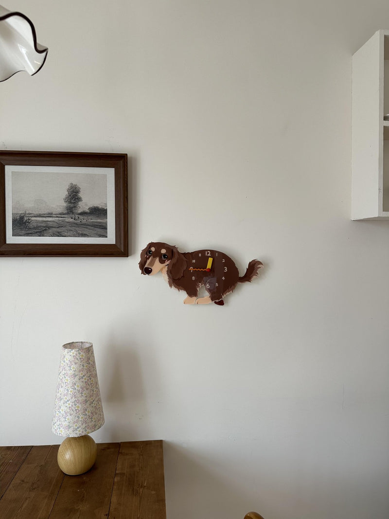 Long-Haired Dachshund pendulum wall clock in a home setting 4