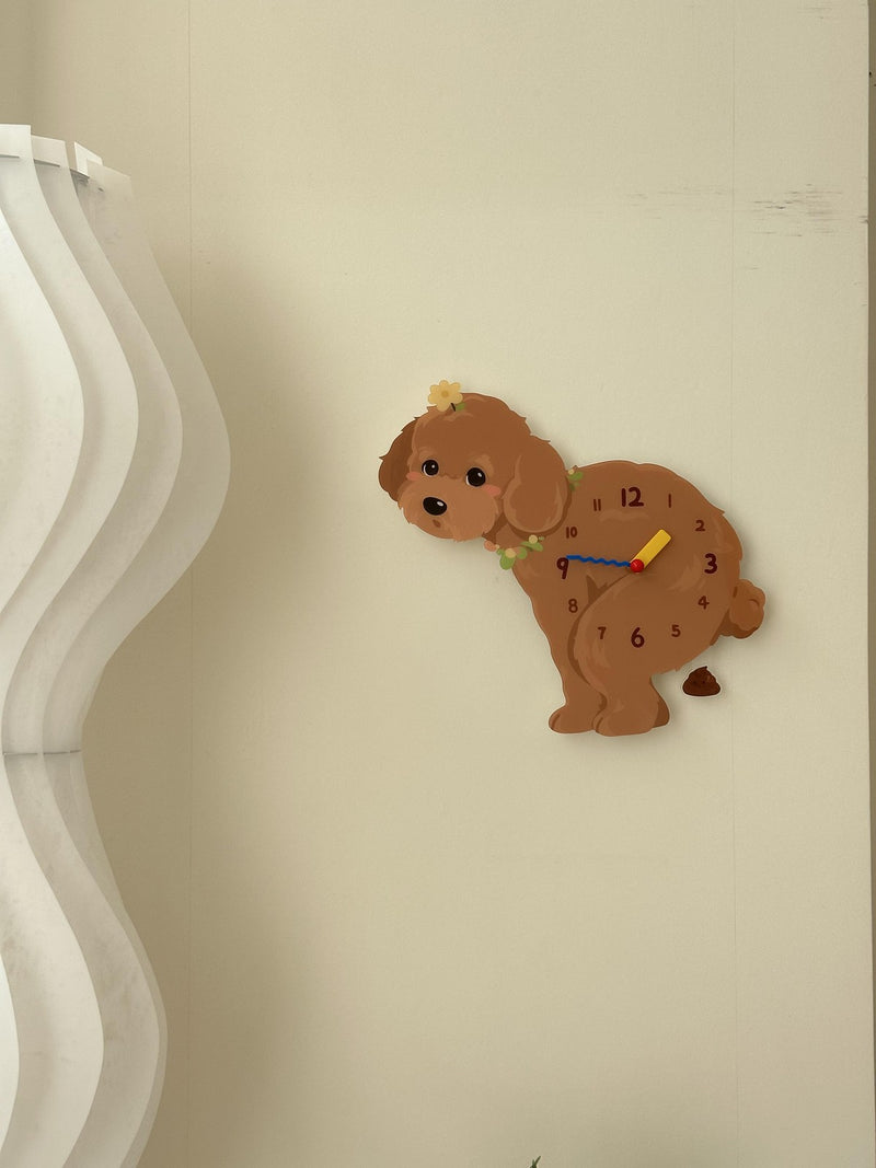 Teddy Poodle Poop-Time pendulum wall clock in a home setting 2