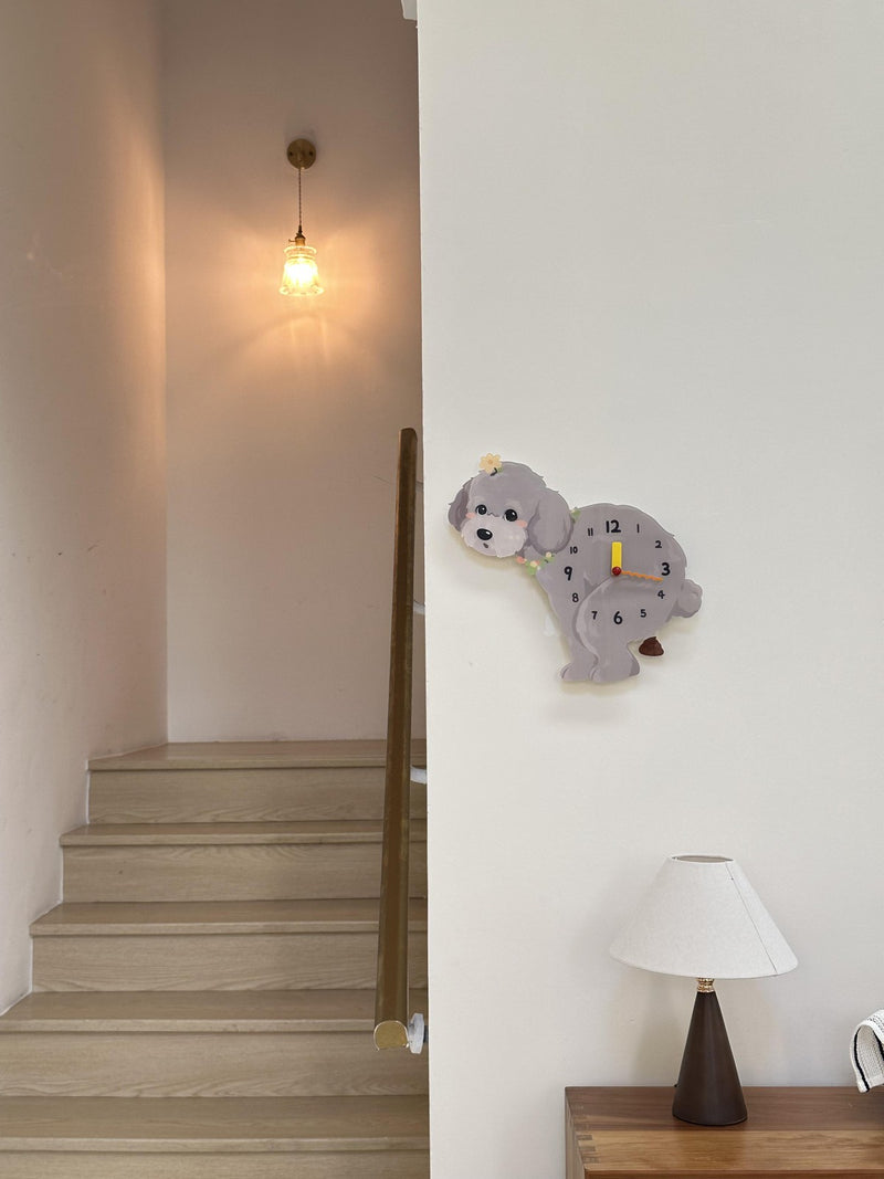 Teddy Poodle Poop-Time pendulum wall clock in a home setting 4